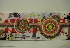 "Red Line" The background is collage on canvas paper consisting of human rights hand flyers stapled into an old closet shelf.